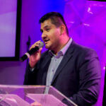A picture of another client, Michael Perez, who has hired us for virtual assistant help.